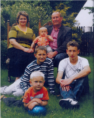 Wioletta i Fabian Małeccy z synami